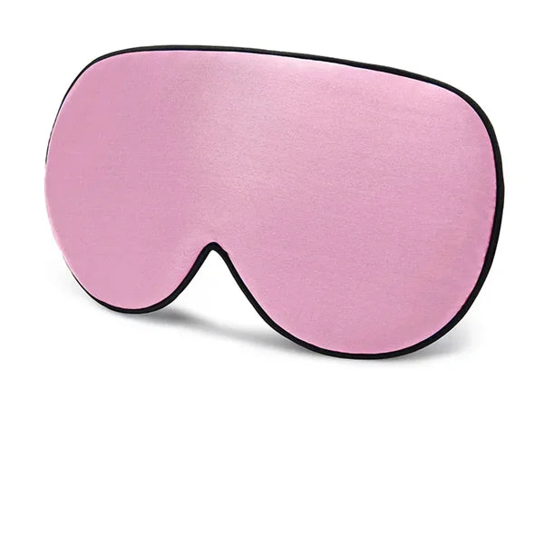 Masque de nuit en soie rose avec liseré noir, vue de face
