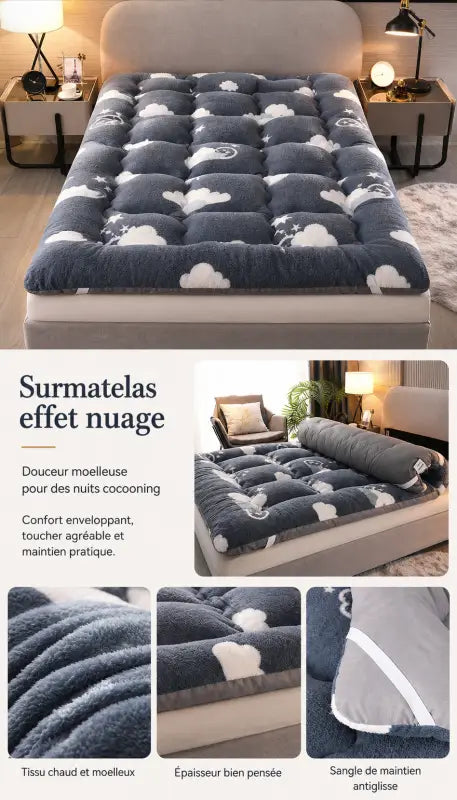 Surmatelas effet nuage bleu marine avec motif nuages et étoiles, sur un lit