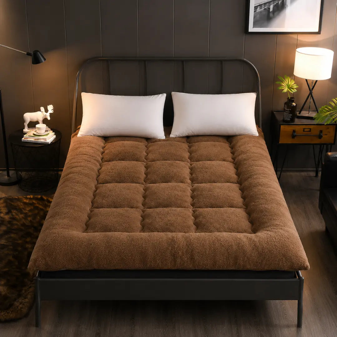 Surmatelas en duvet