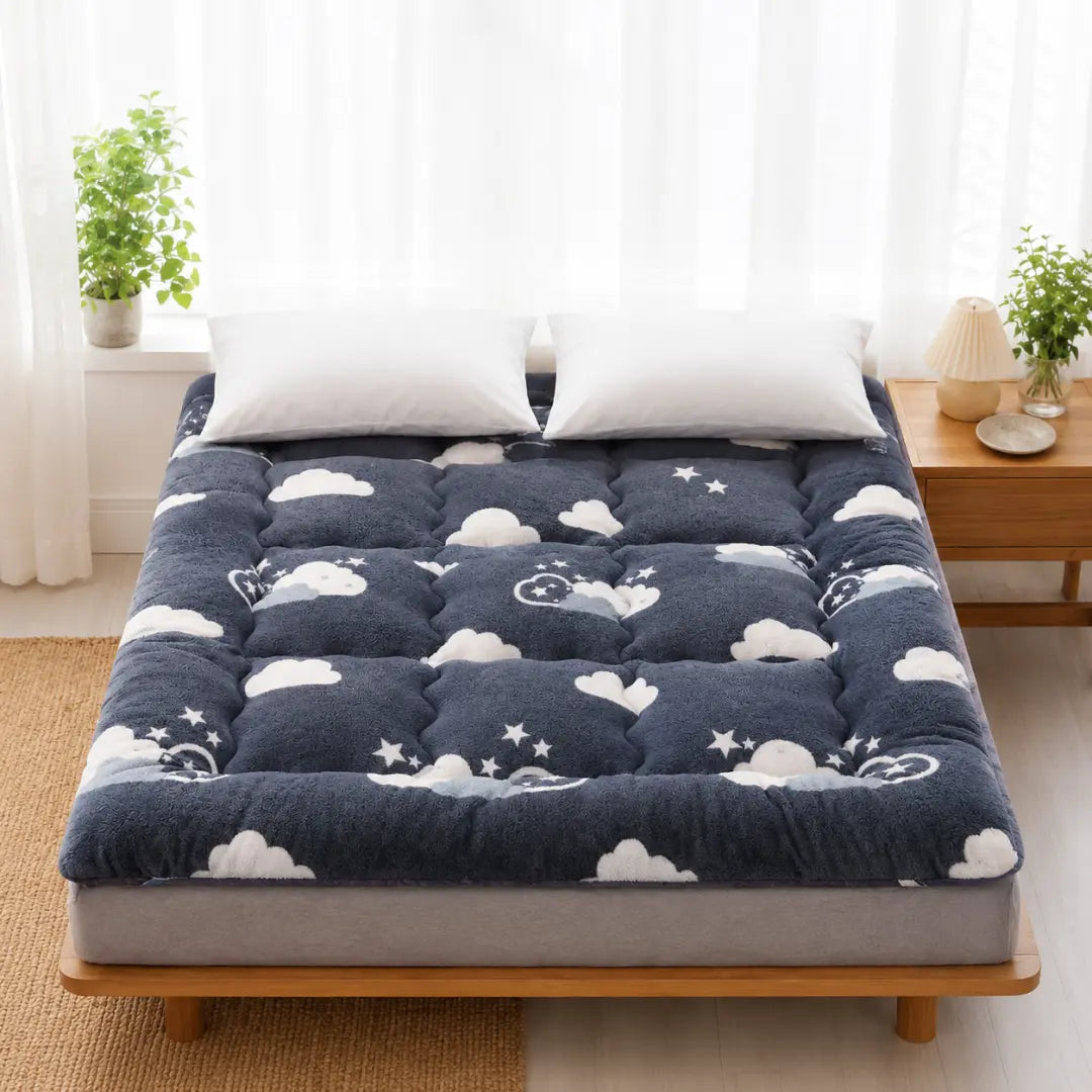 Surmatelas en duvet