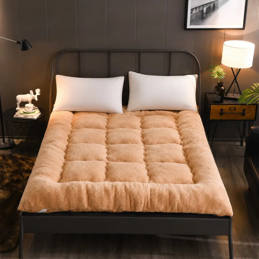 Surmatelas en duvet