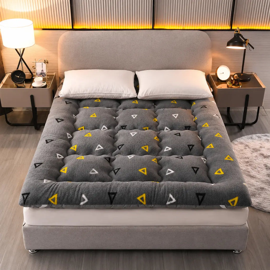 Surmatelas en duvet
