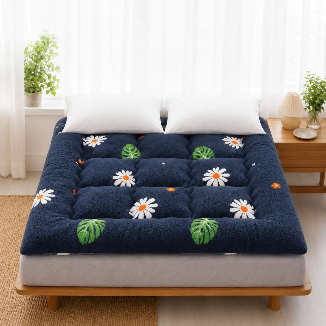Surmatelas en duvet