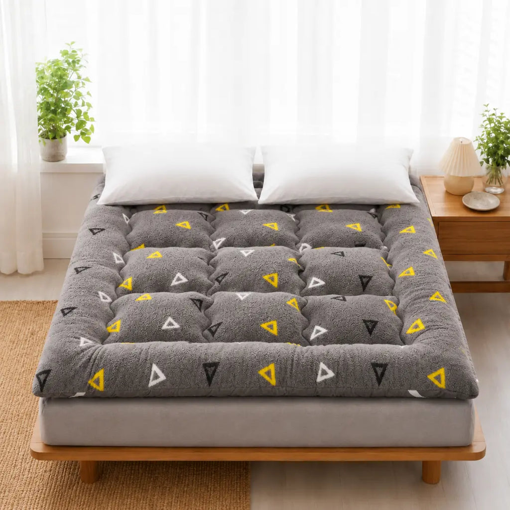 Surmatelas en duvet