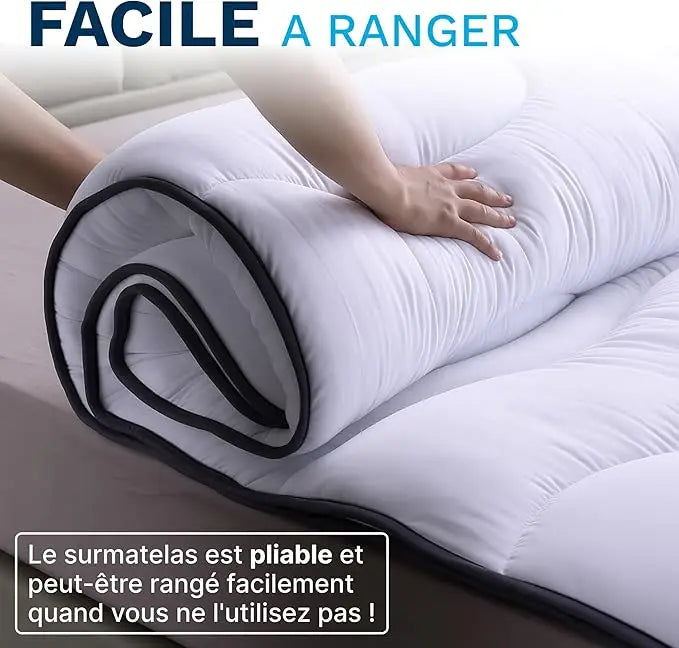 Surmatelas microfibre plié, facile à ranger quand il n'est pas utilisé